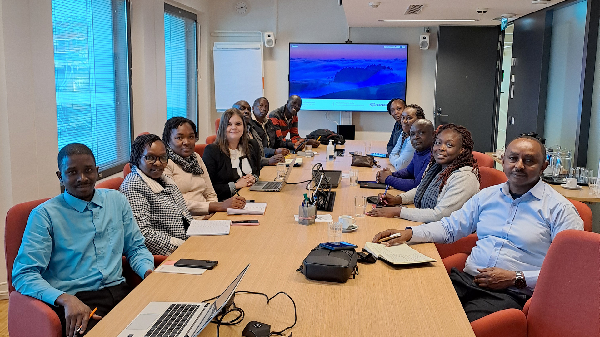 Group of people at a meeting.